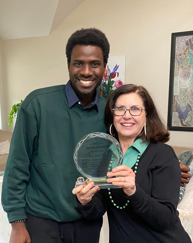 Cloneshouse CEO - Oludotun Babayemi handing Jody Kusey the Cloneshouse Lifetime Advisor Plaque in the United States